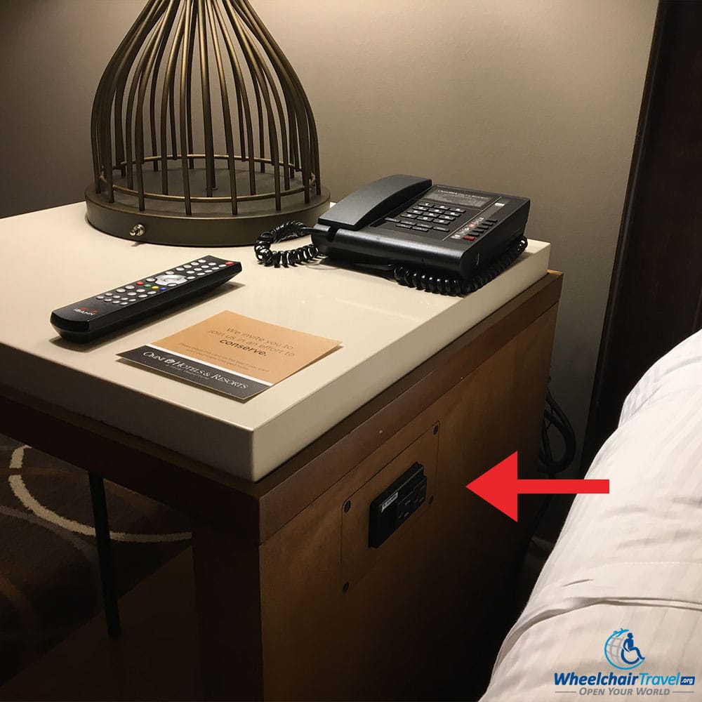 Bedside table/nightstand, with built-in power outlets.