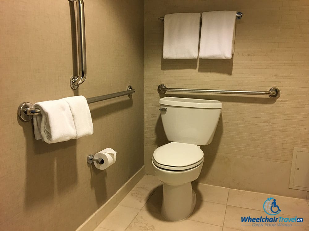 Bathroom toilet with grab bars at Hyatt Centric Arlington hotel