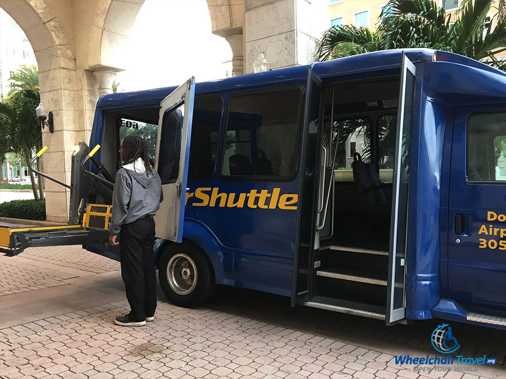 SuperShuttle minibus with wheelchair lift extended