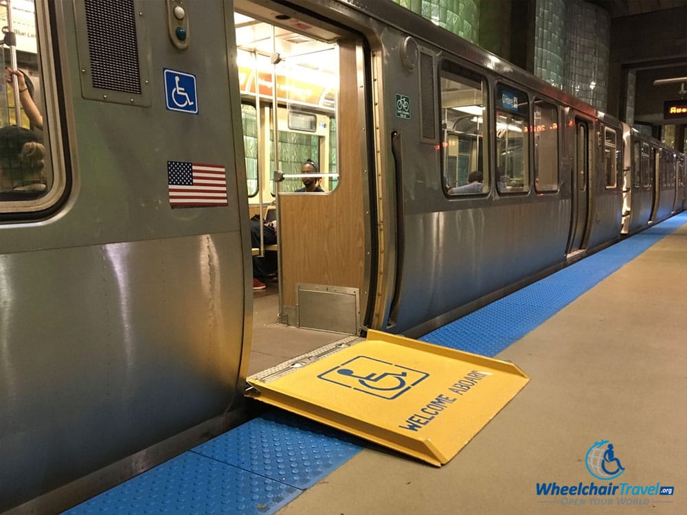 Chicago L train at O'Hare Airport with wheelchair ramp for boarding.