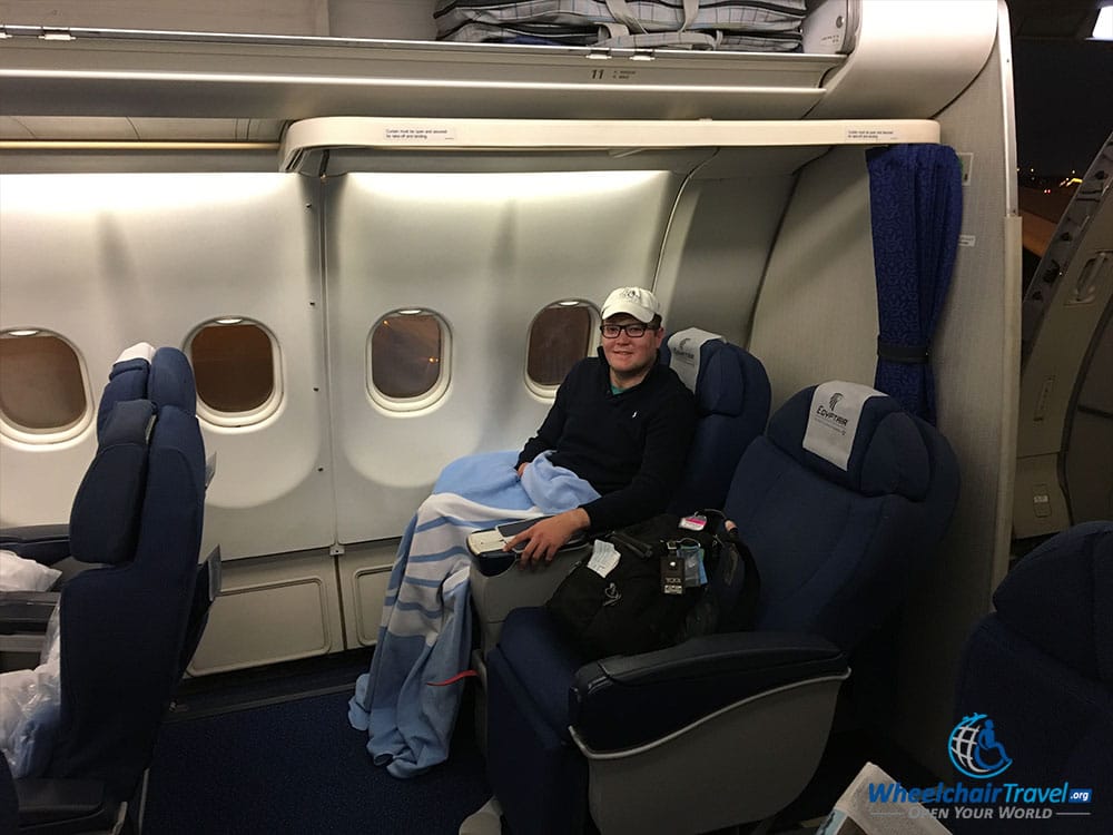 John Morris seated in EgyptAir business class