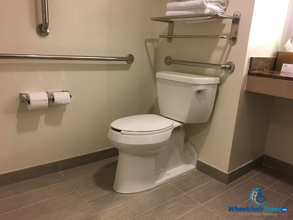 Wheelchair accessible toilet with grab bars