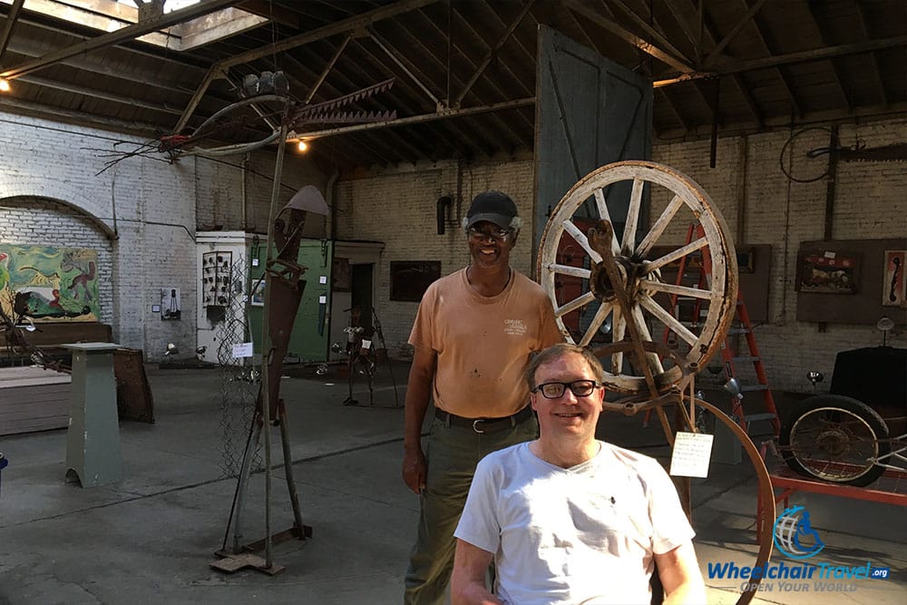 John Morris posing with Charlie Lucas, in the artist's Selma, Alabama gallery