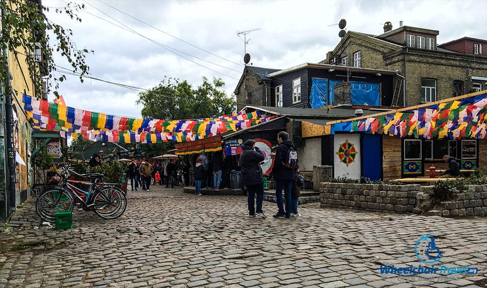 Cobblestone street in Freetown Christiania, Copenhagen, Denmark.