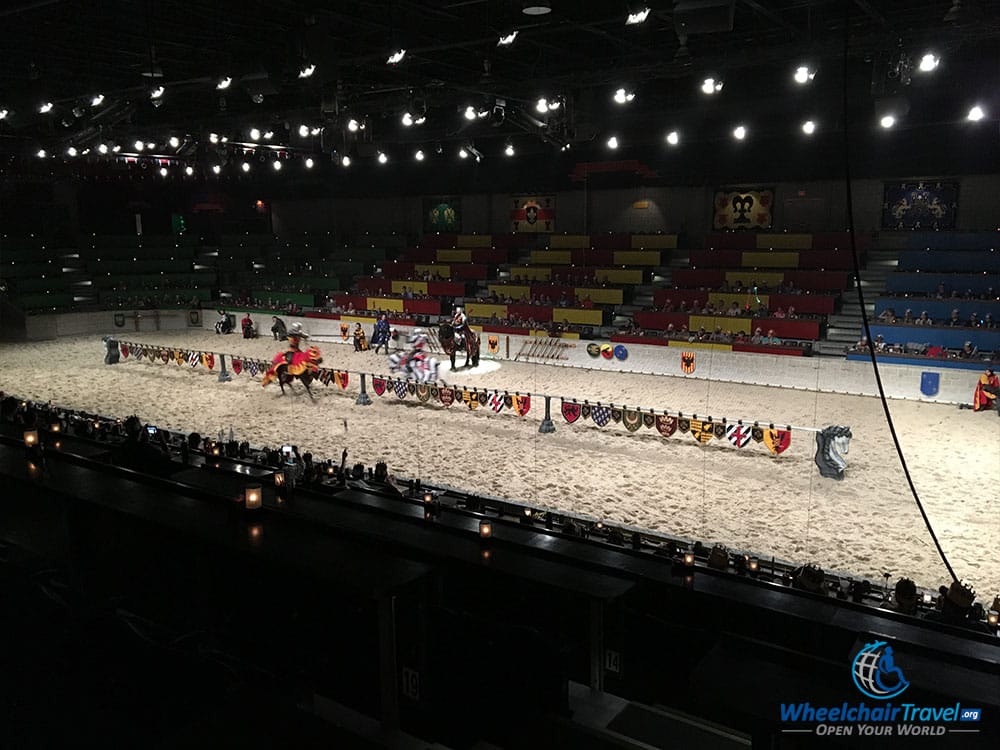 Two knights jousting on horseback at the Medieval Times Tournament.