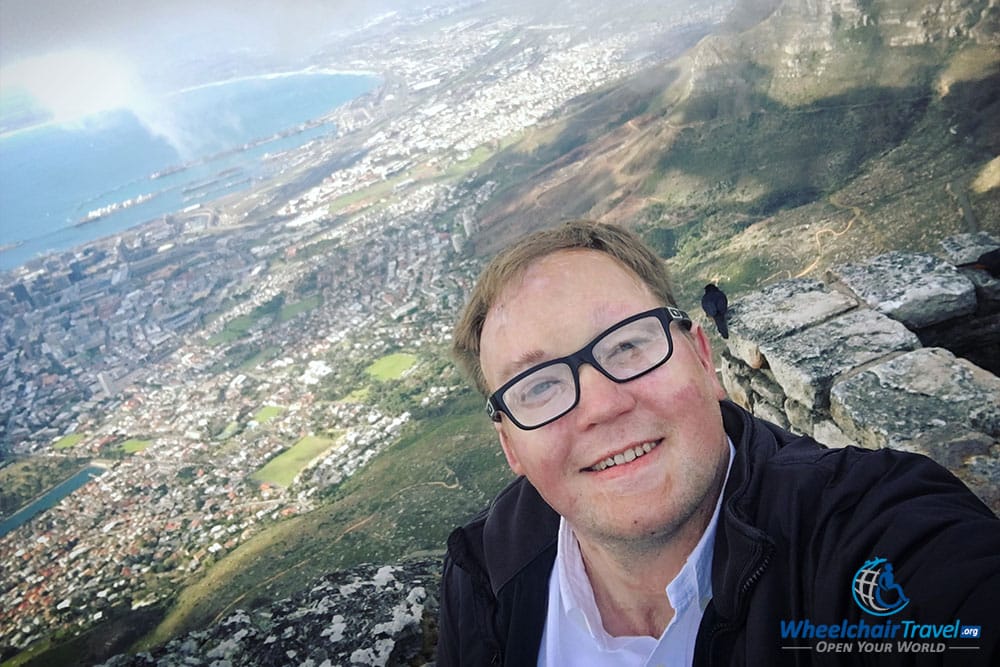 Taking a selfie on Table Mountain, with the city of Cape Town in the background