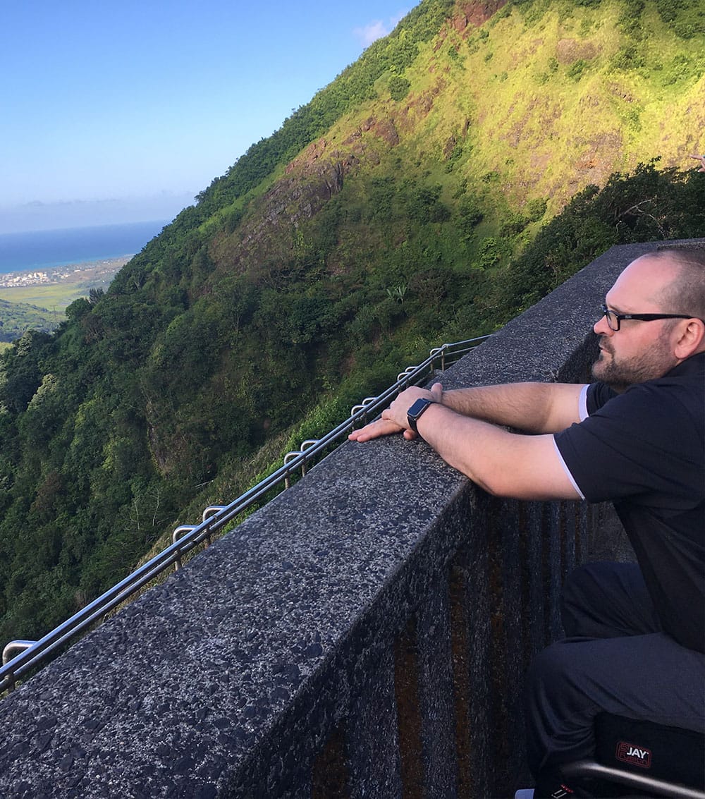 Josh Albert taking in the view from a scenic overlook.