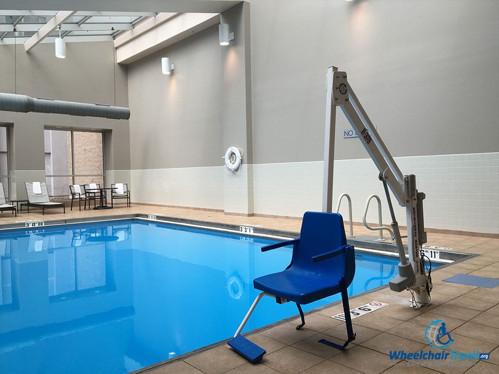 Swimming pool with self-operating lift.