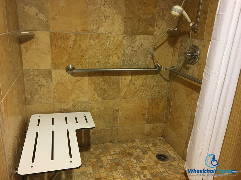 Roll-in shower that is not ADA compliant at the Hampton Inn Cleveland Downtown.