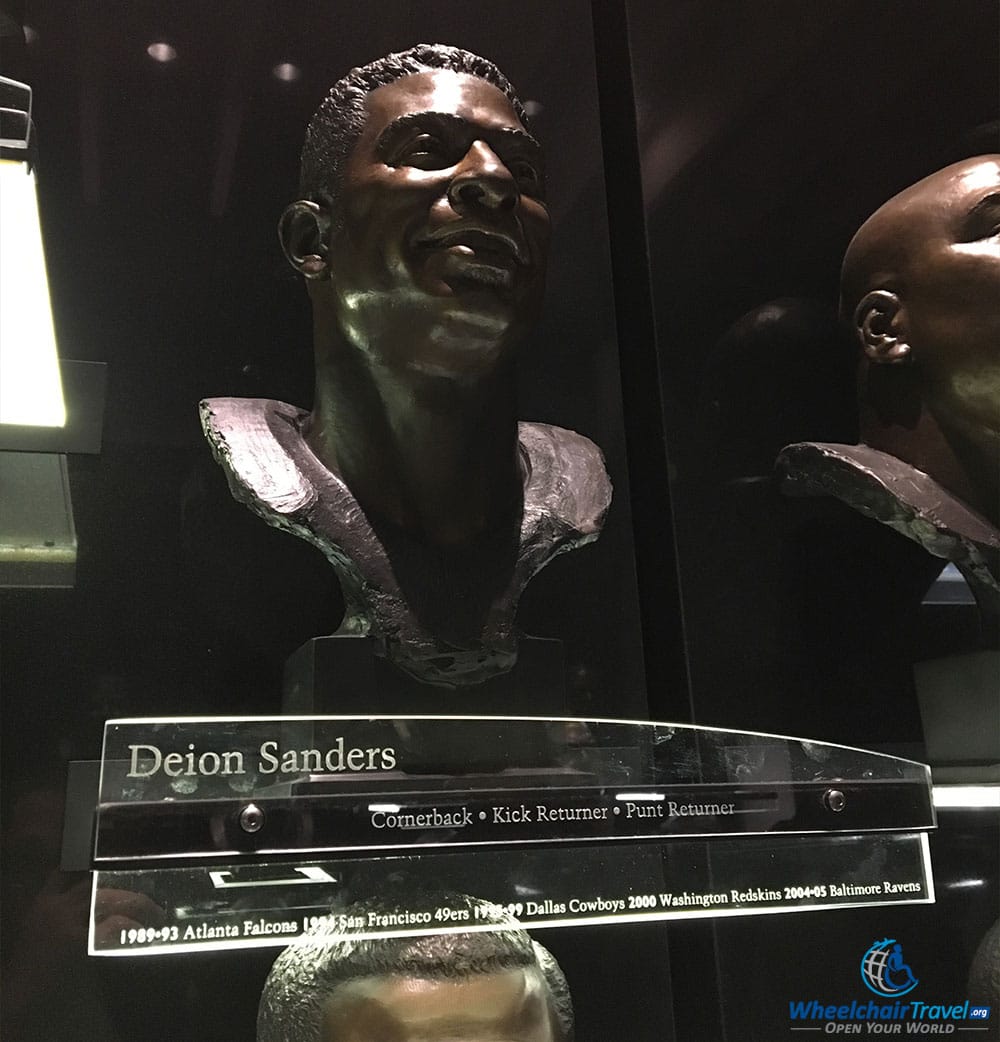 Bronze bust of Deion Sanders at the Pro Football Hall of Fame.