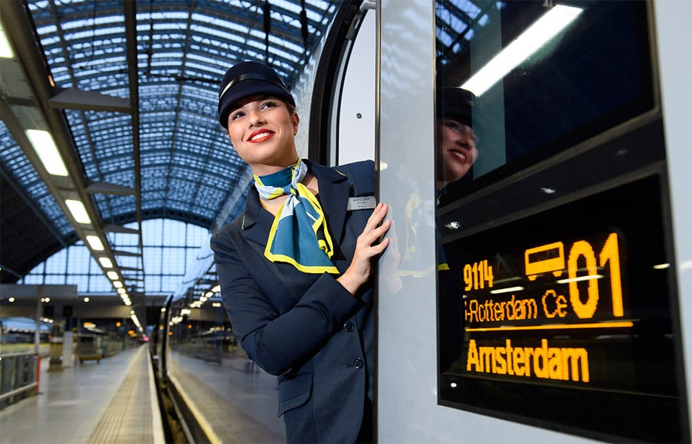 Eurostar team member looks out of a train bound for Amsterdam.