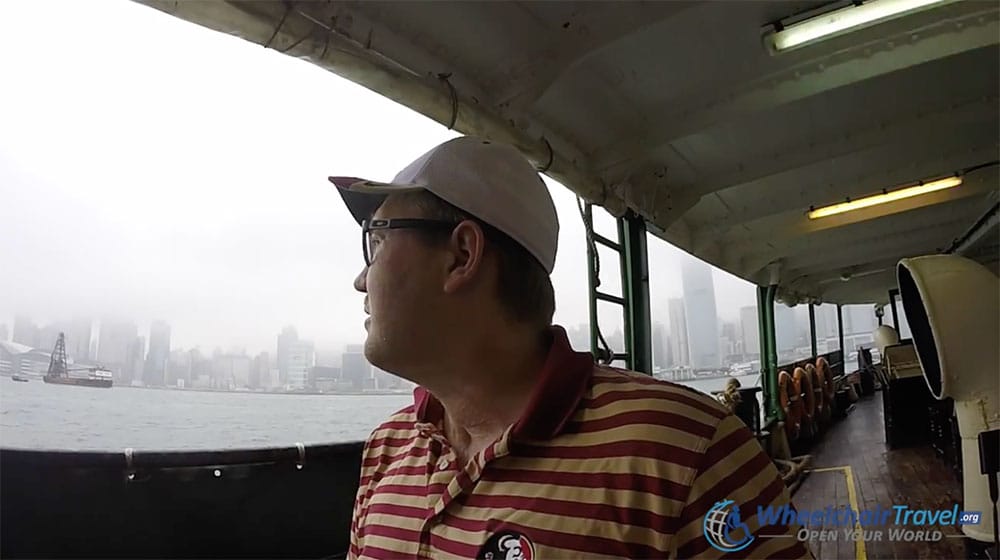 Wheelchair user riding the Hong Kong Star Ferry.