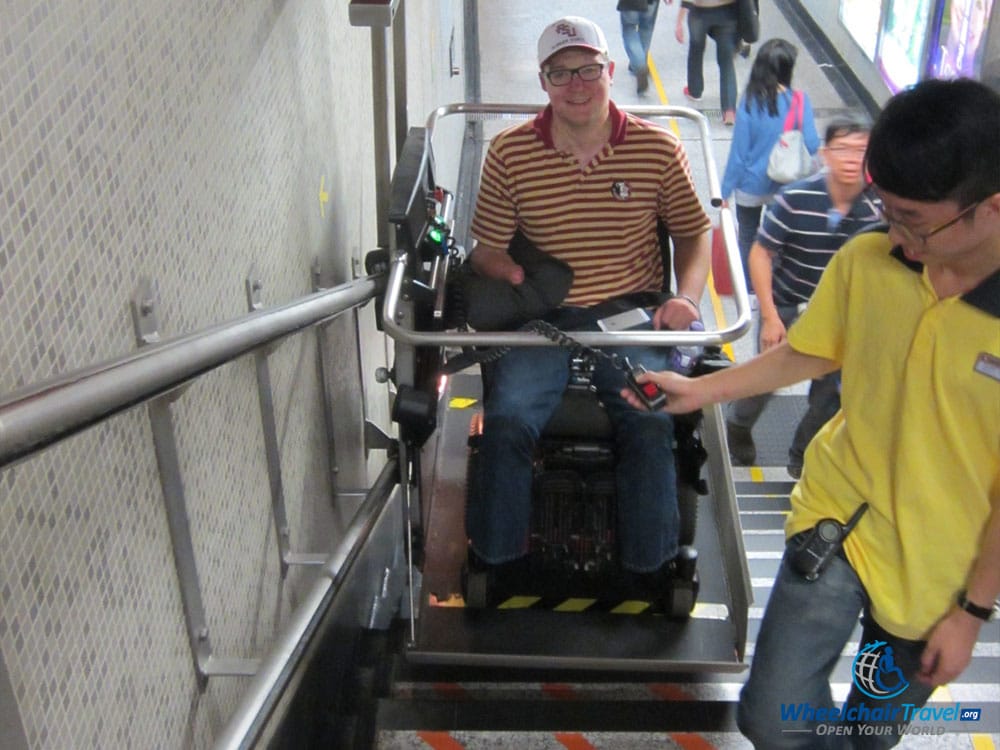 Wheelchair stair lift at Hong Kong MTR.