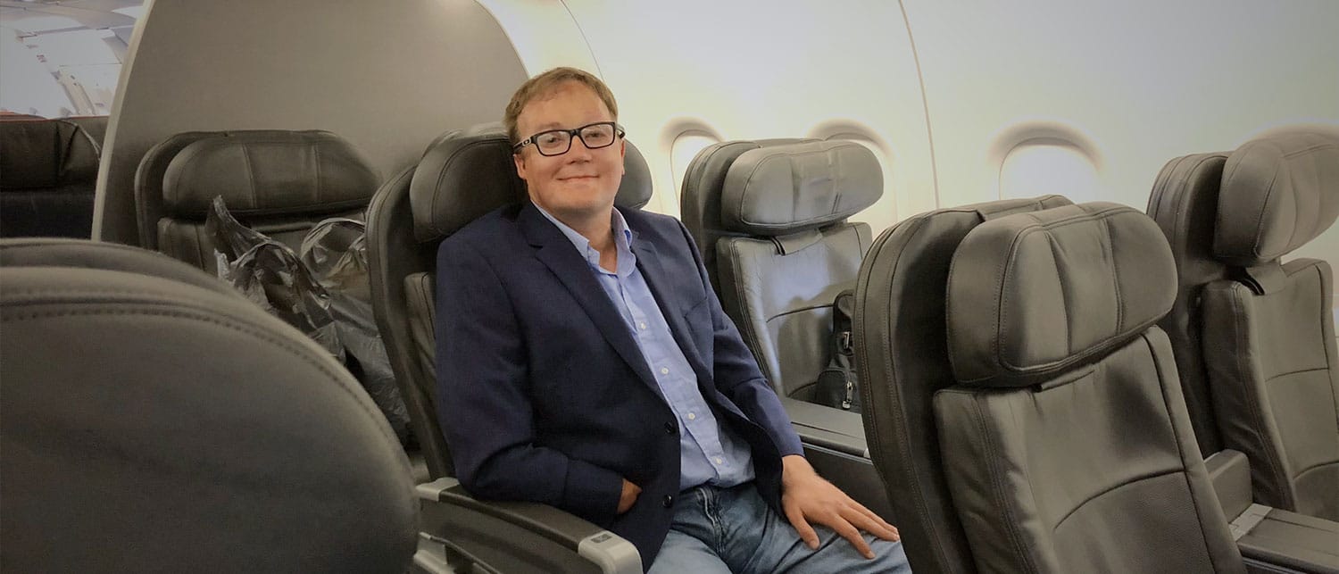 Wheelchair travel expert Joh Morris on an airplane.