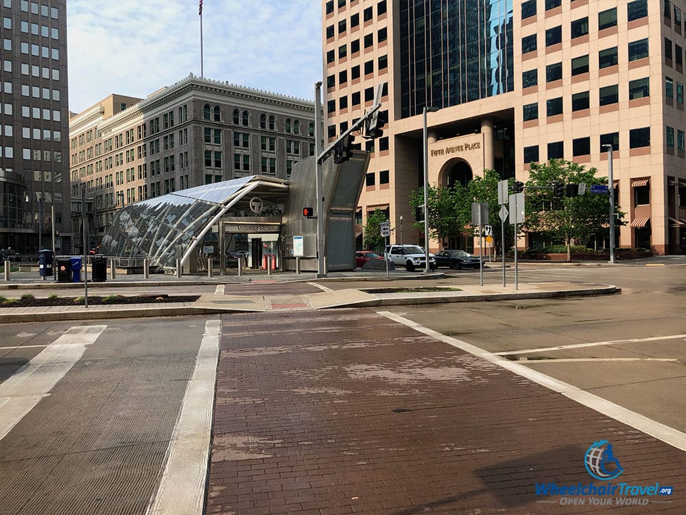 Wheelchair accessible sidewalk and crosswalk.