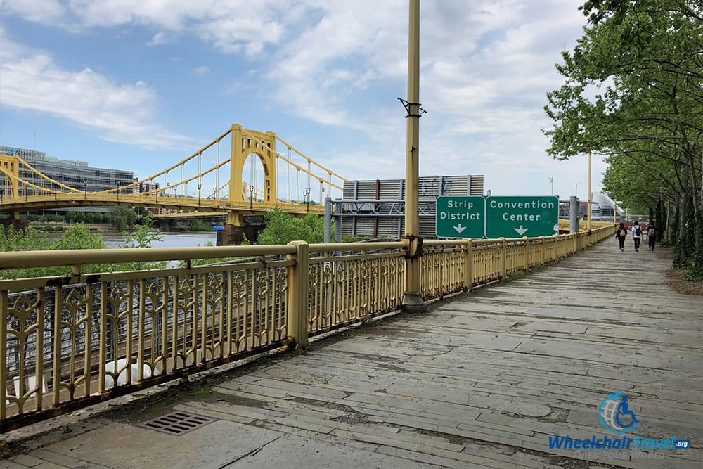 Extremely rough, uneven walkway along Fort Duquesne Blvd.