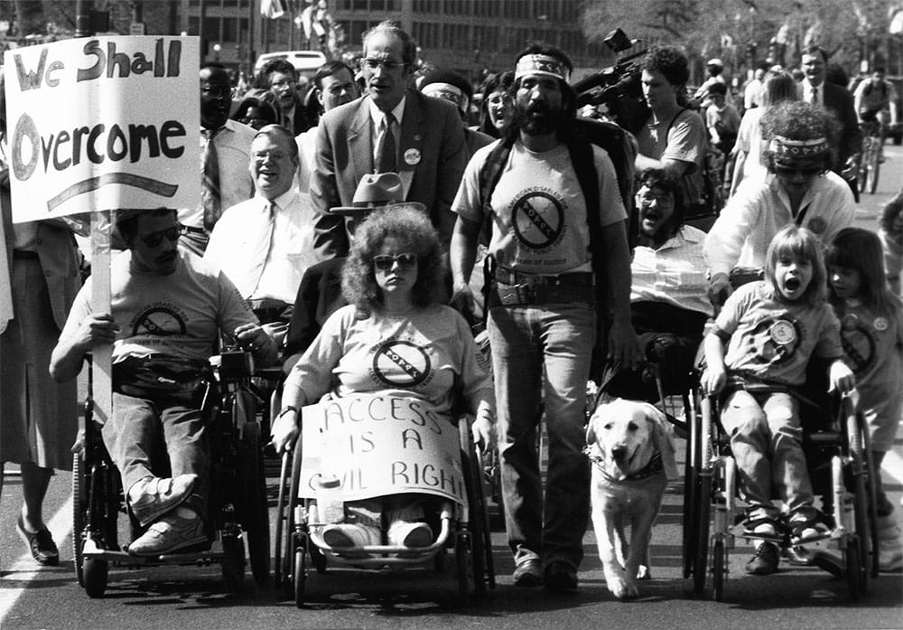 Disability activists march to promote equal access. | Photo by Tim Olin.