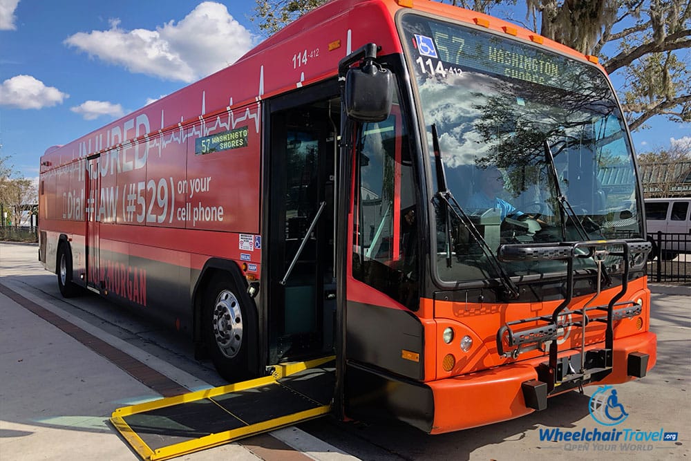 City bus with wheelchair ramp extended.