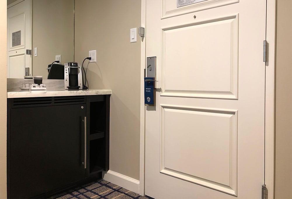 Mini bar next to guest room door.