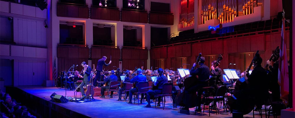 Andrew Bird onstage at the John F. Kennedy Center for the Performing Arts.