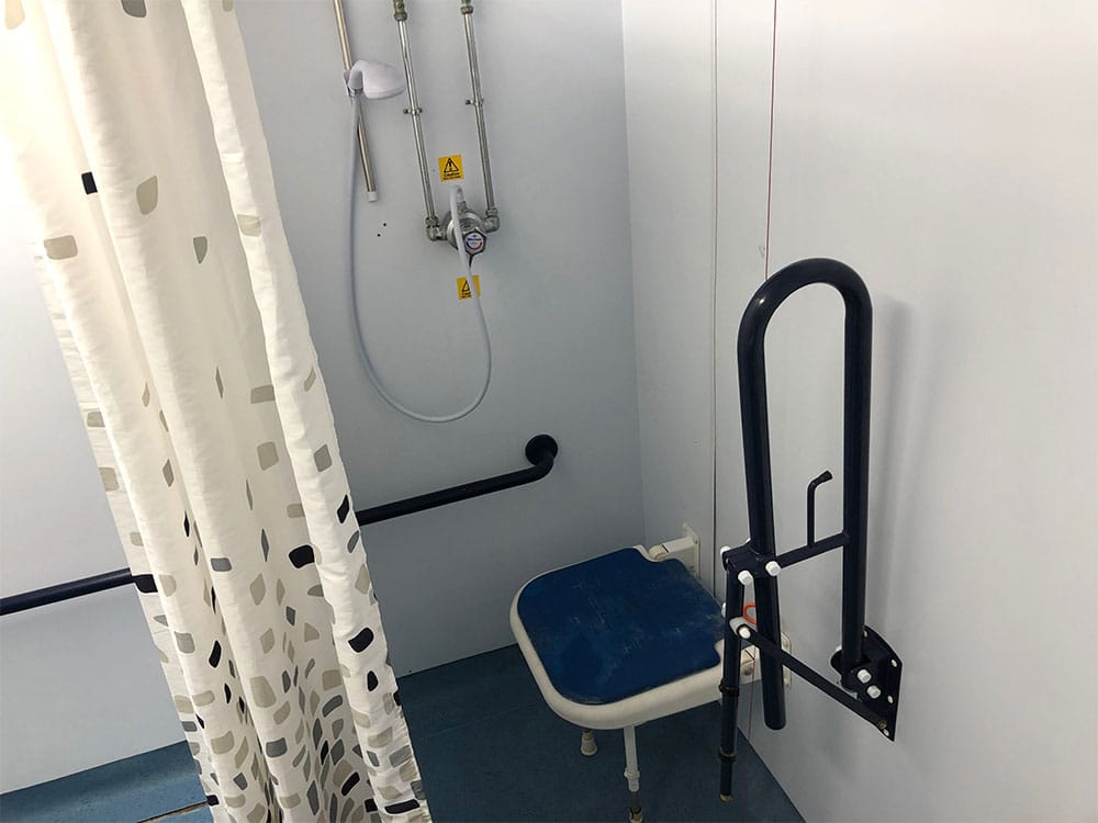 Wheelchair accessible roll-in shower at Generator Hostels London.