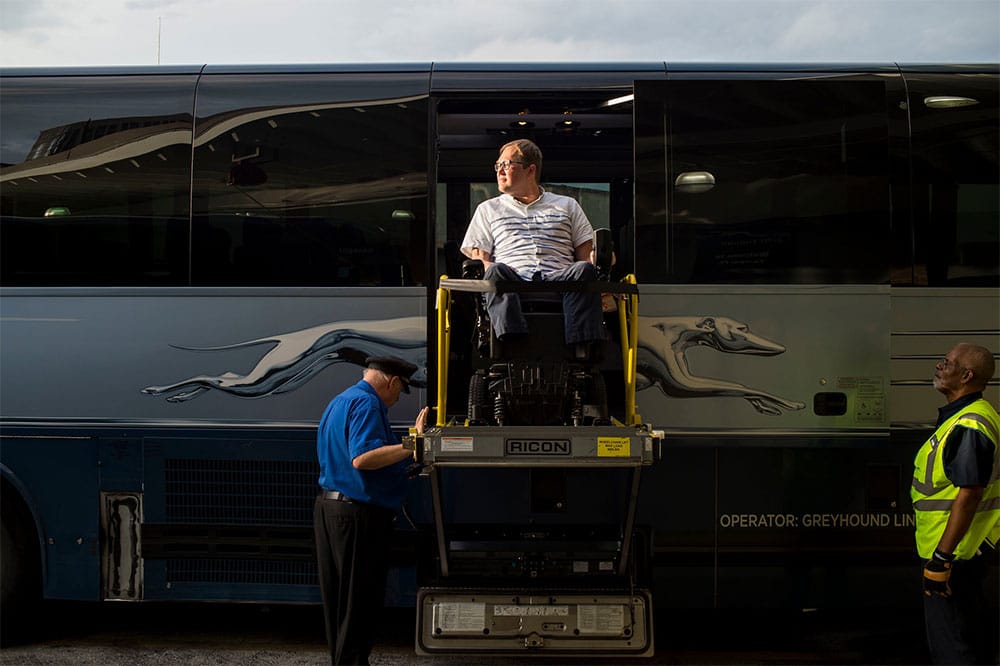 Using the wheelchair lift on a Greyhound Bus. | Photo by Zack Wittman/The New York Times.