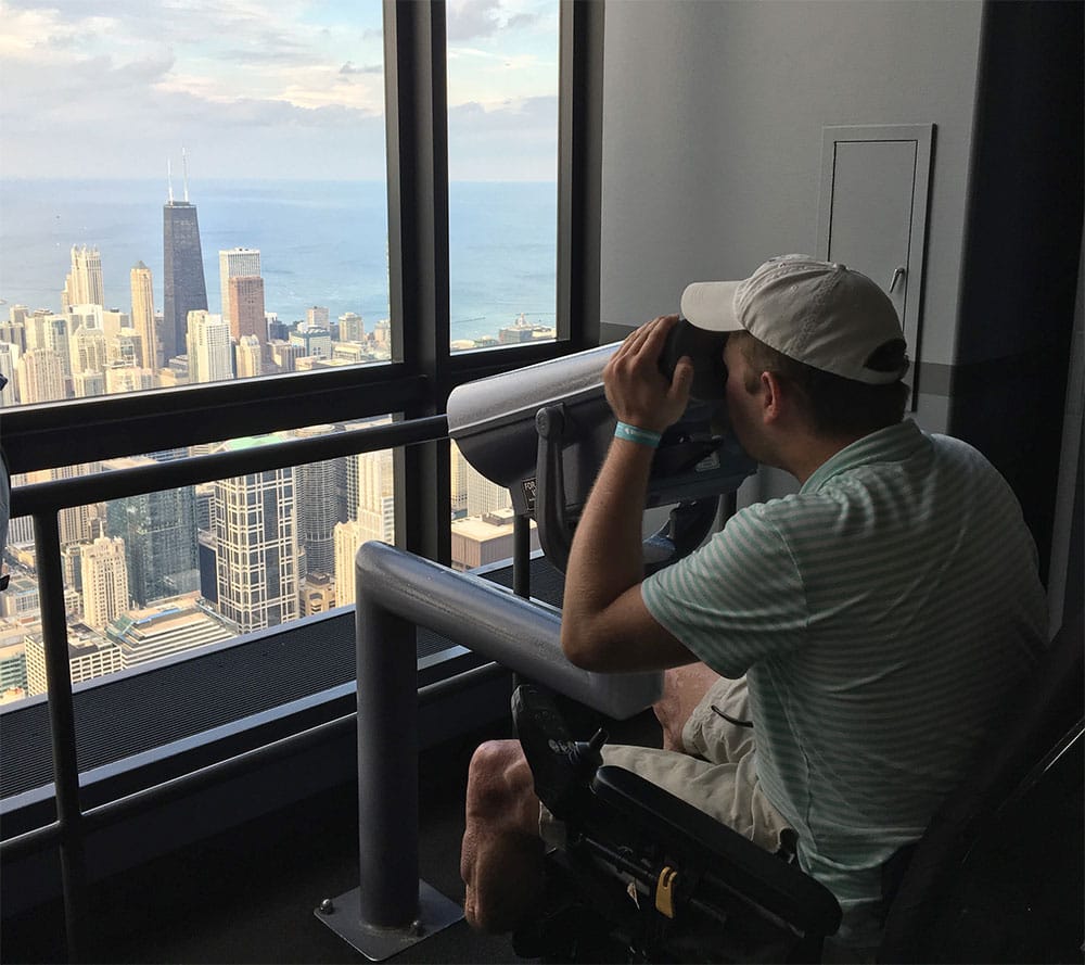 Looking out over the Chicago skyline from the Willis Tower.