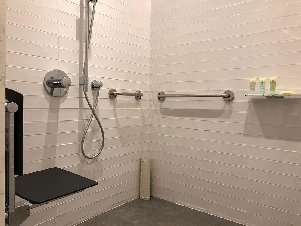 Spacious roll-in shower.