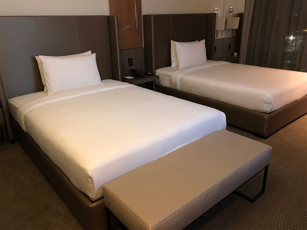 Guest room with two twin beds at the Grand Hyatt Bogota.