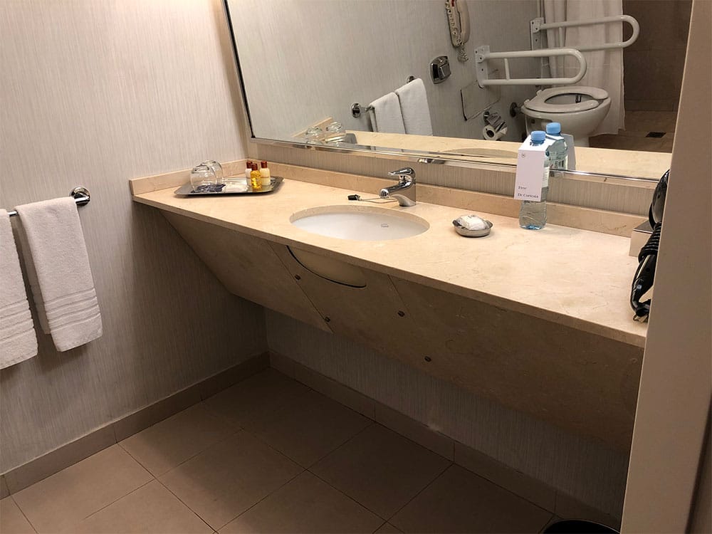 Bathroom sink in accessible guest room.