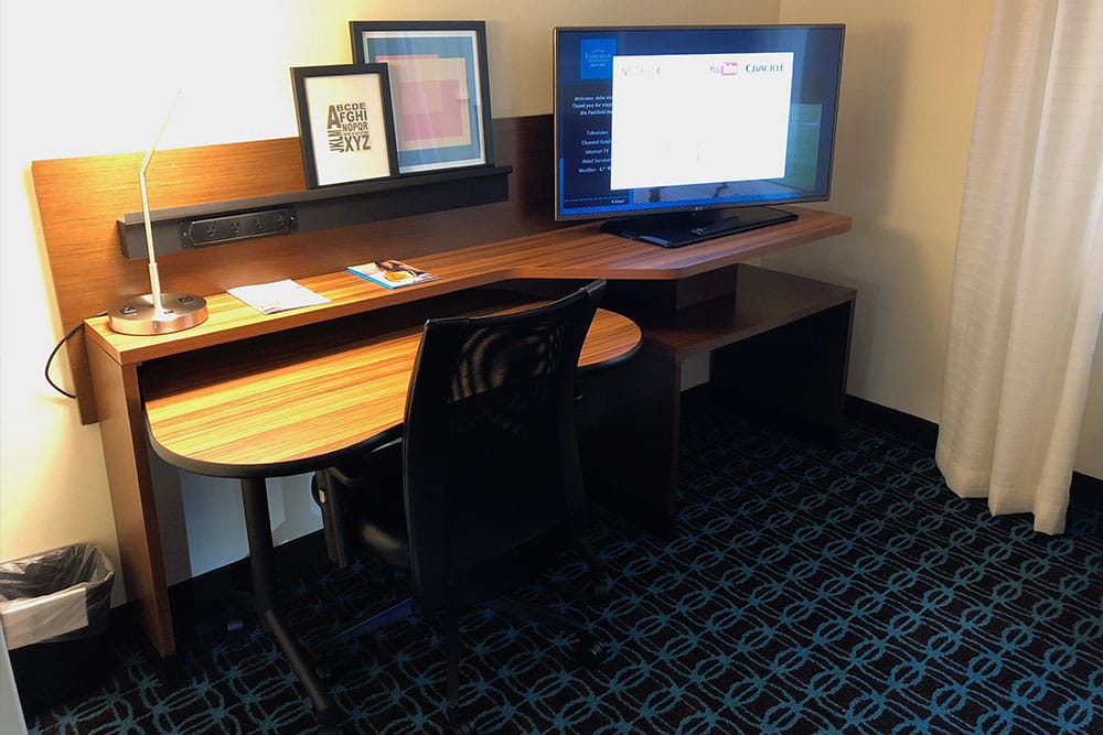 Desk with rolling chair.