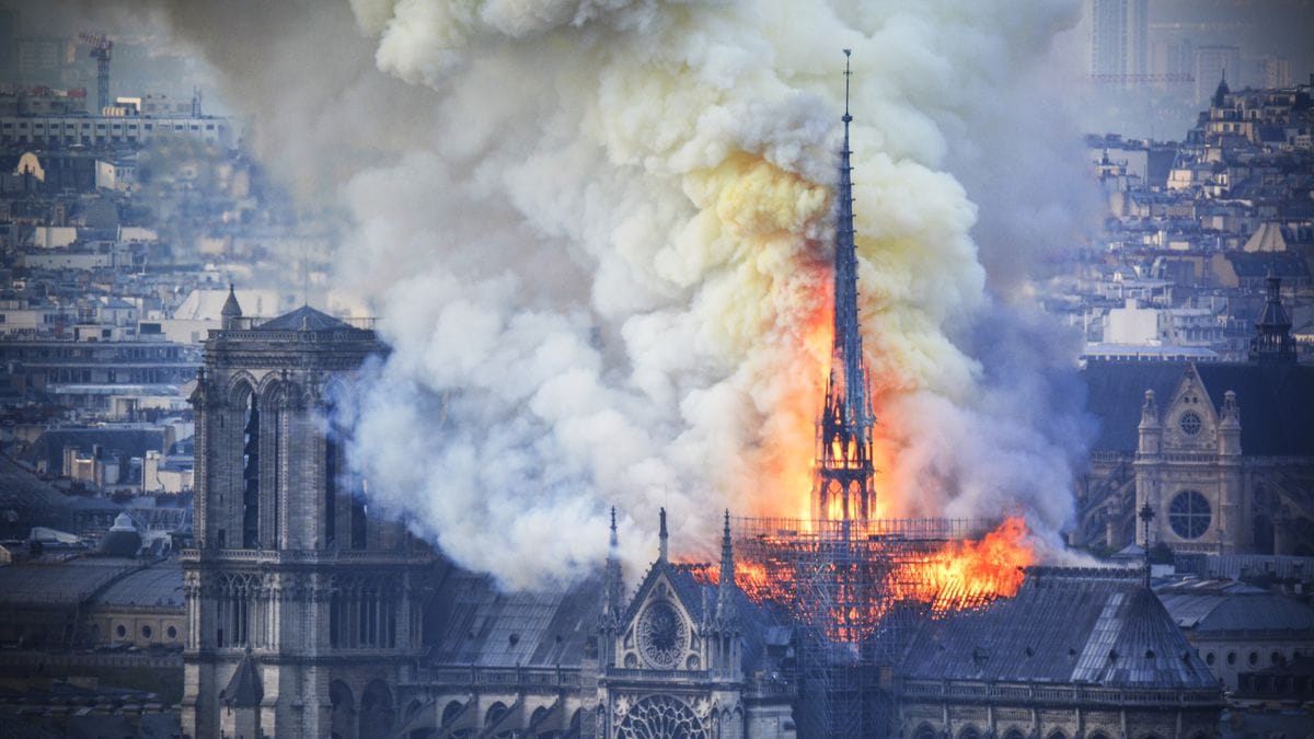 Smoke and flames erupt from Notre-Dame Cathedral. Photo courtesy Hubert Hitier/AFP.