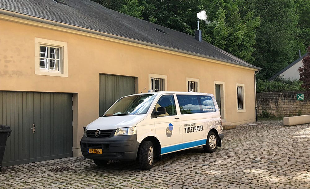 Time travel machine, a Volkswagen van on cobblestone street in Luxembourg City.