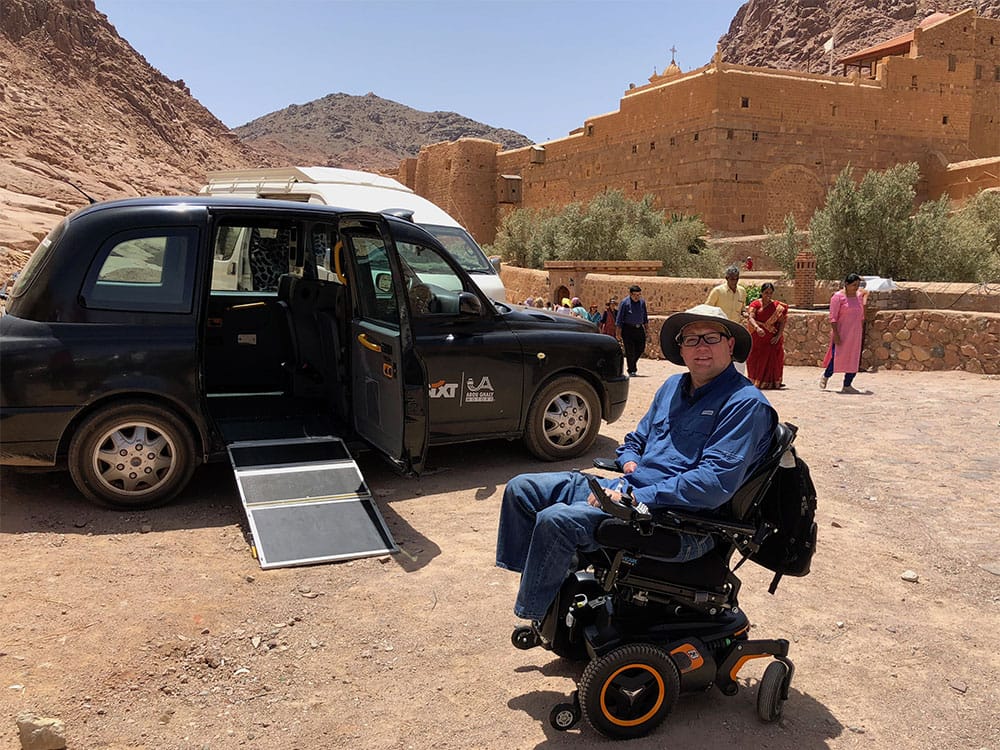 Wheelchair taxi with ramp extended at St. Catherine's Monastery.