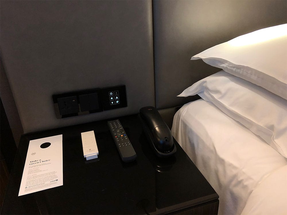 Power outlets and light controls at bedside.