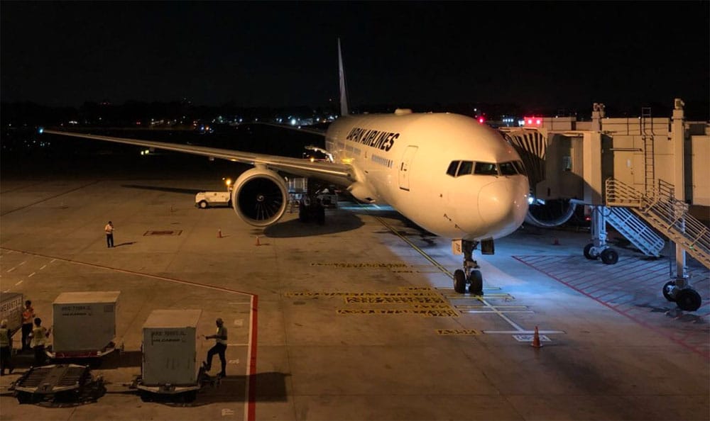 Japan Airlines Boeing 777 airplane at Singapore Changi Airport.