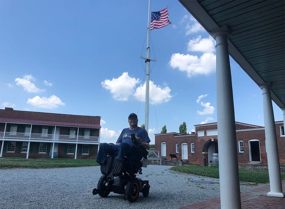 Wheelchair user exploring Fort McHenry.