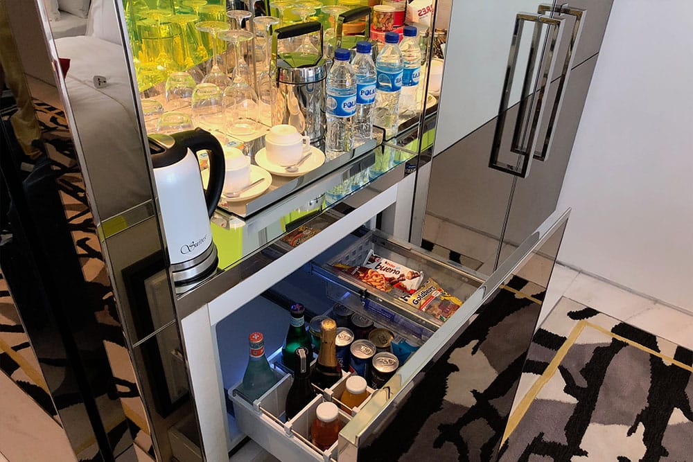 Mini bar inside a drawer refrigerator.