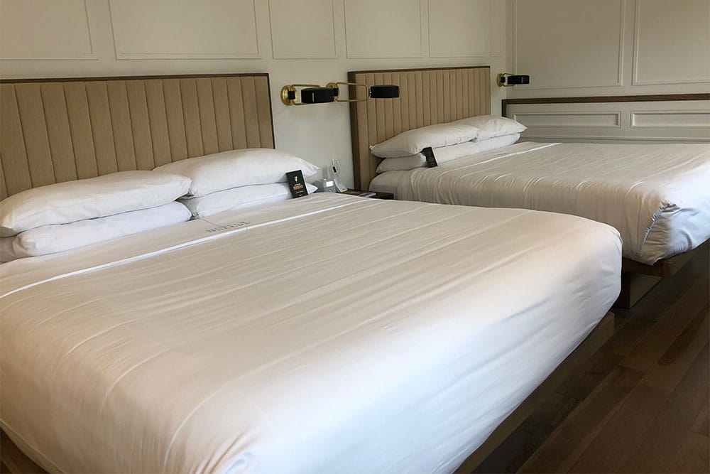 Two king size beds at Noelle Nashville Hotel.