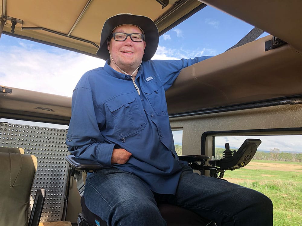 Looking out of the pop-up rooftop with a height-adjustable wheelchair.