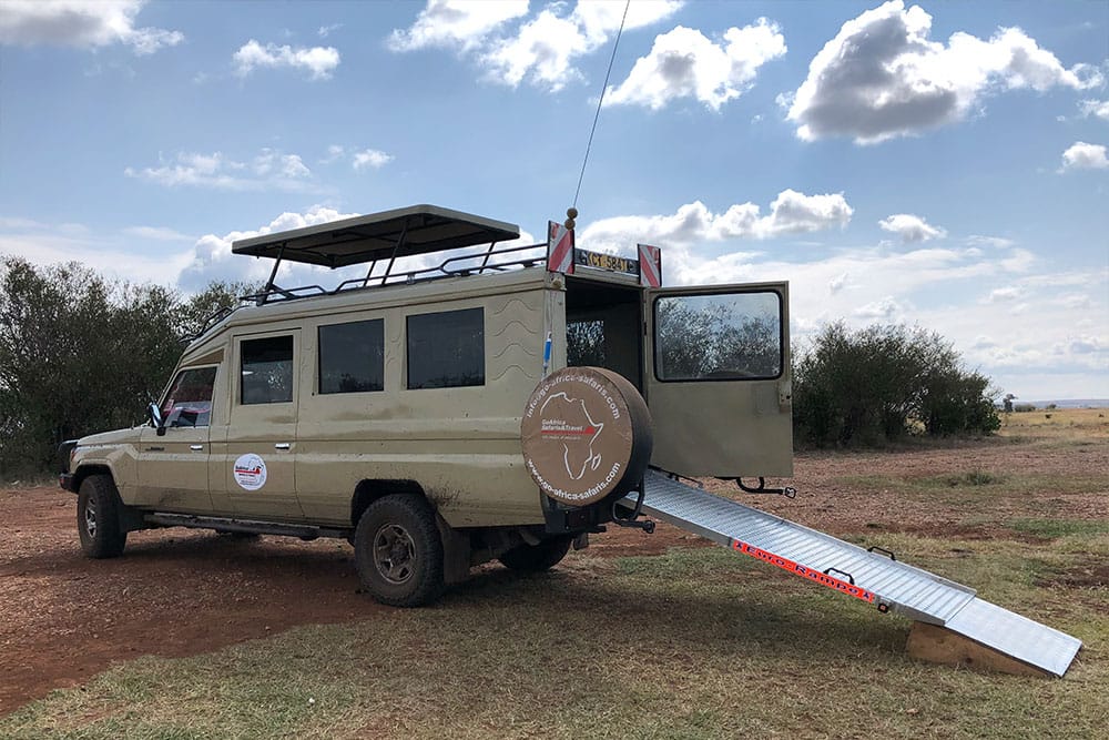 Safari vehicle with wheelchair ramp.