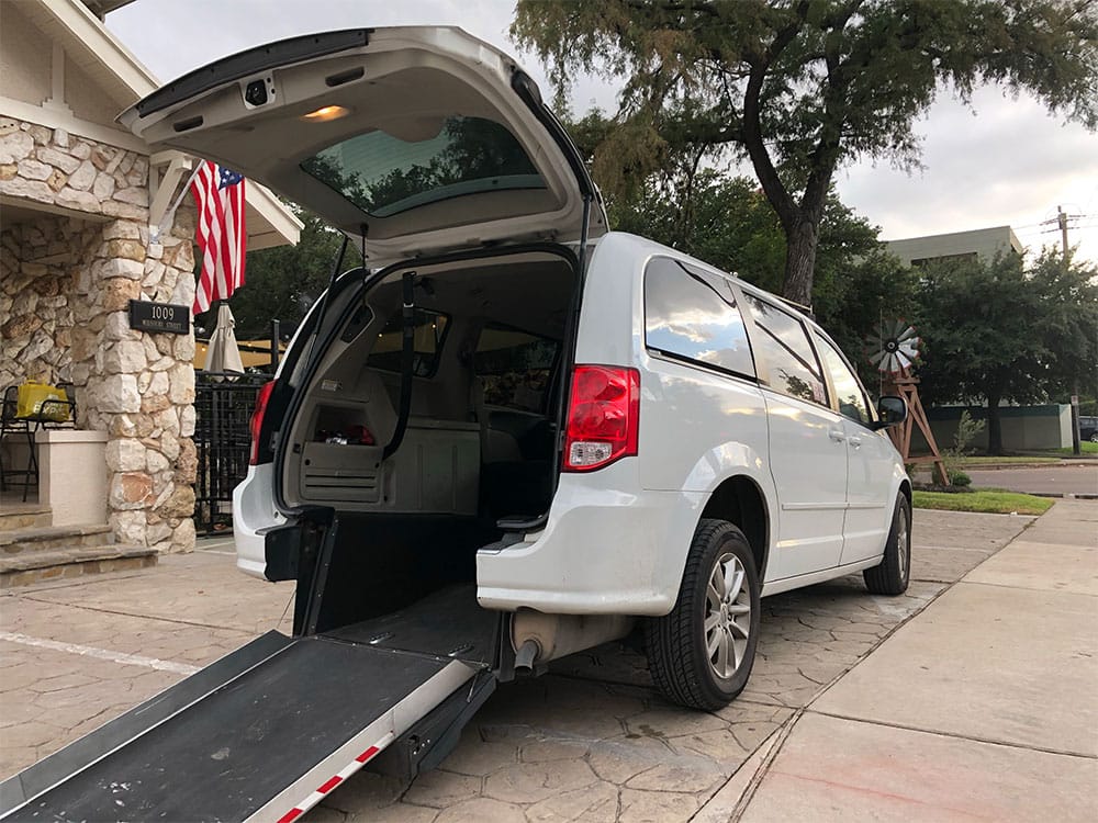 Uber WAV van with wheelchair ramp in Houston, TX.