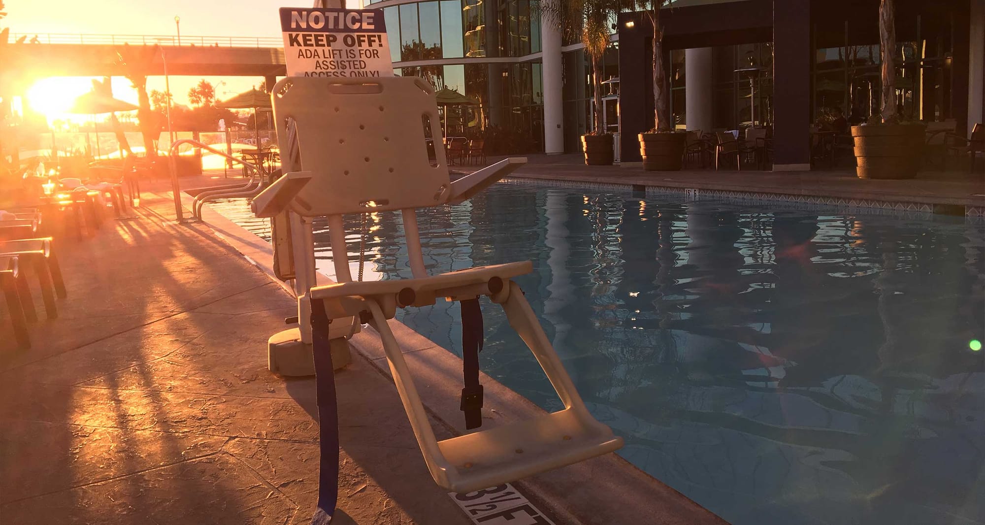 Self-operating pool swimming lift for people with disabilities.