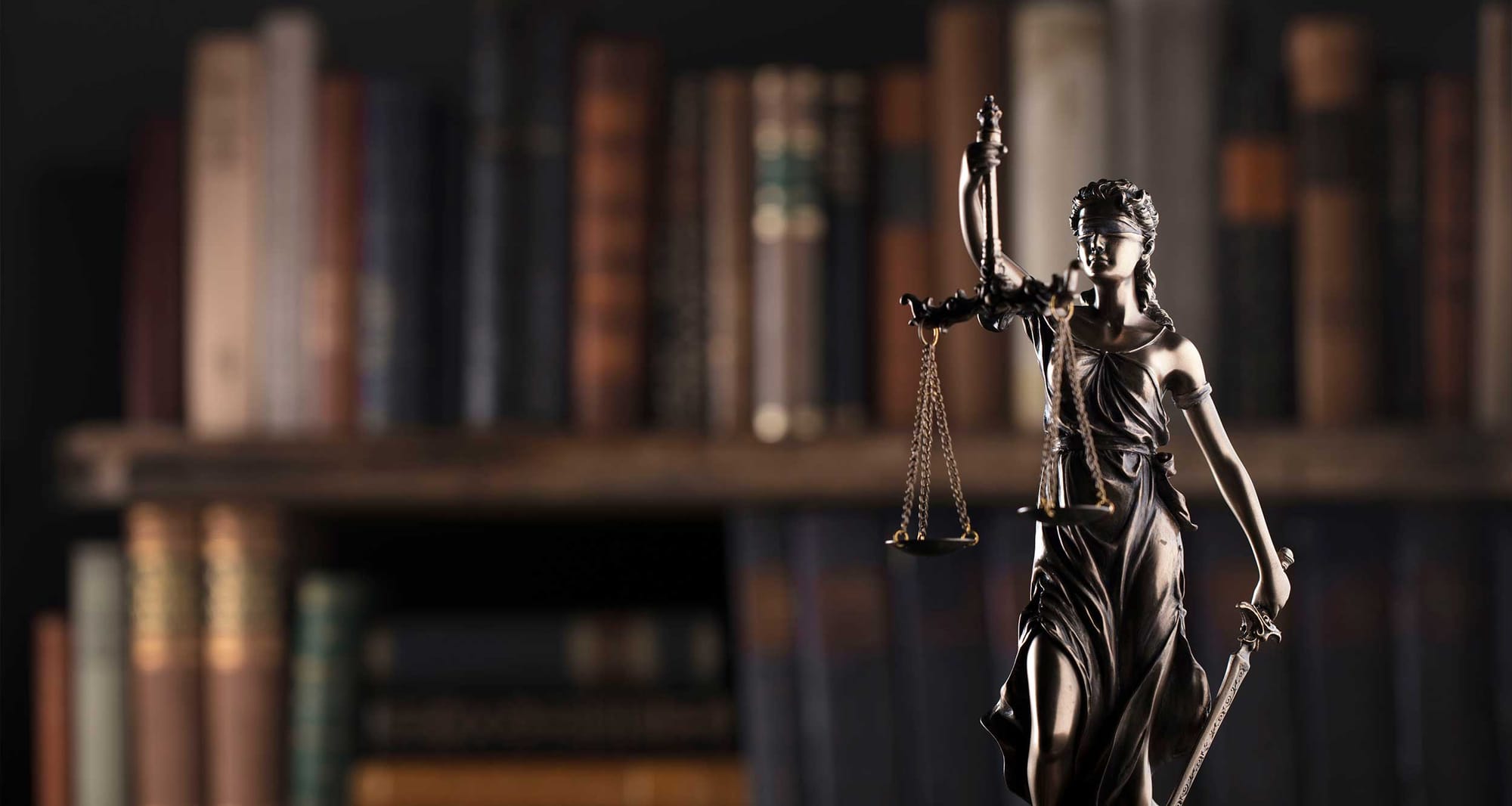 Scales of justice in law firm.