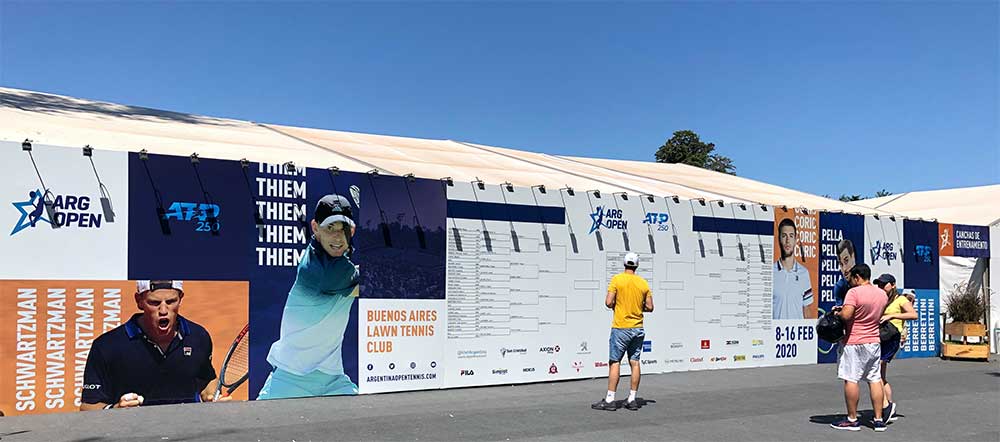 Tournament draw affixed on large wall.