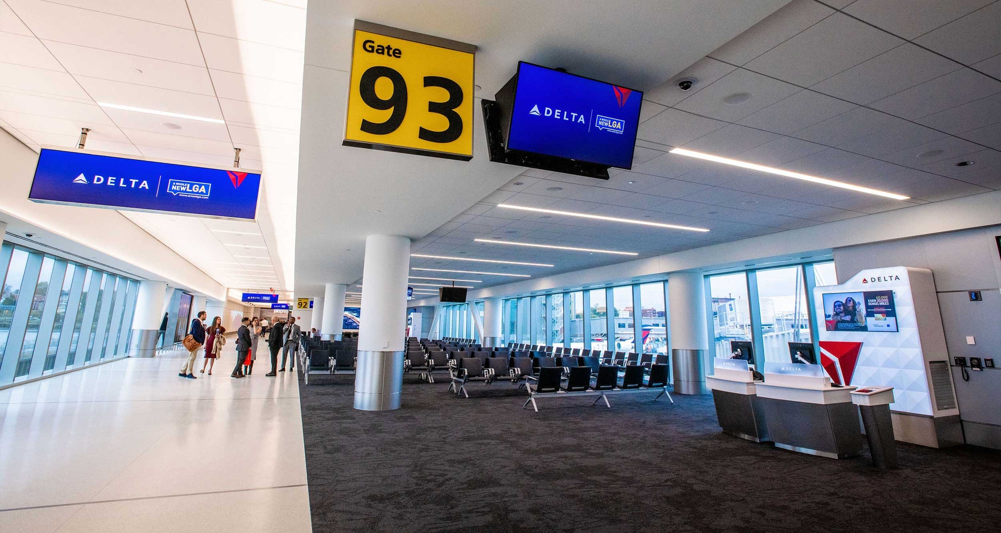 Delta Air Lines boarding gate area at airport.