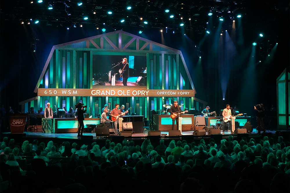 Musicians on stage at the Grand Ole Opry.