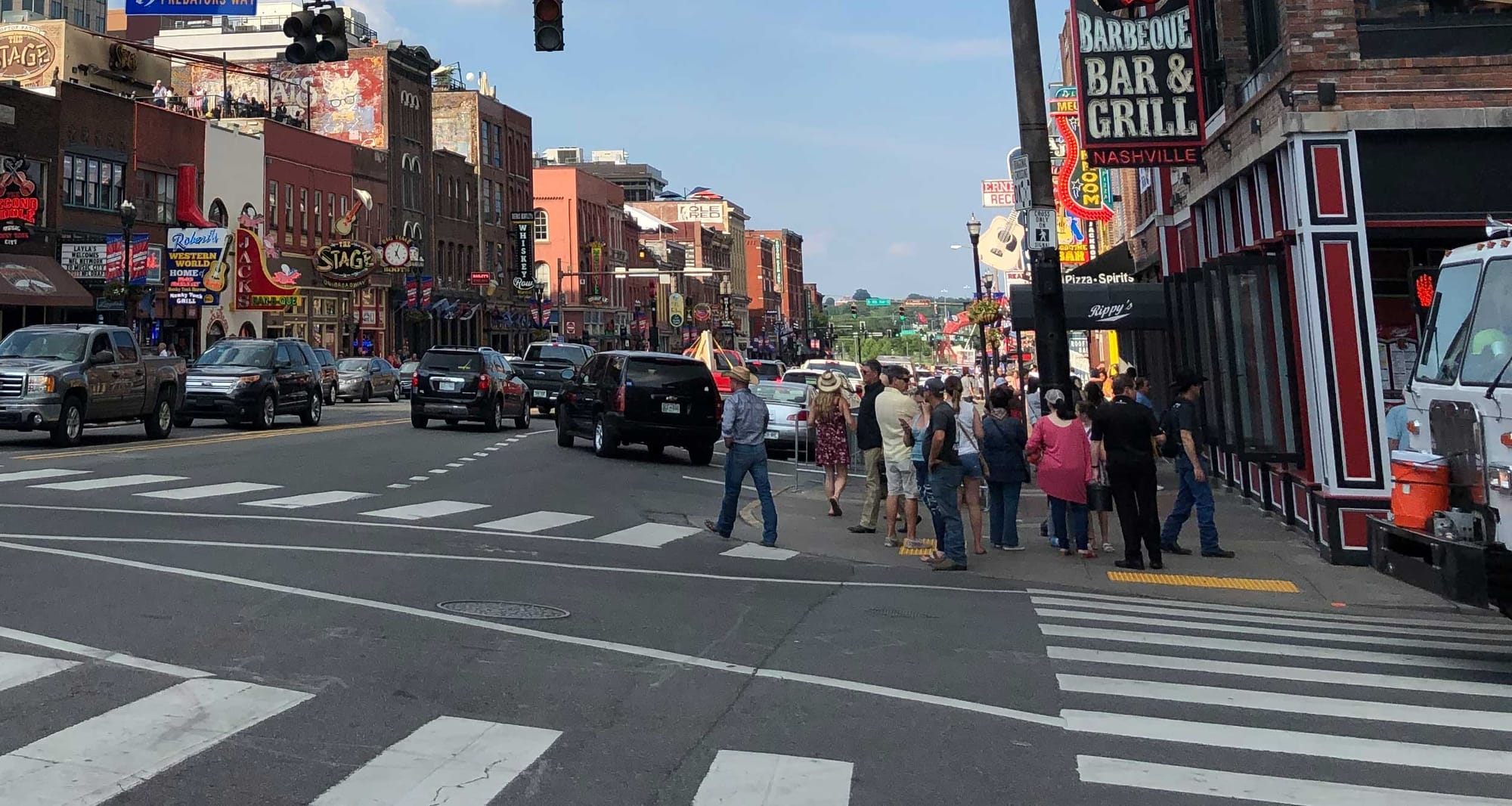 Intersection in Nashville with stoplights and crossing signals.