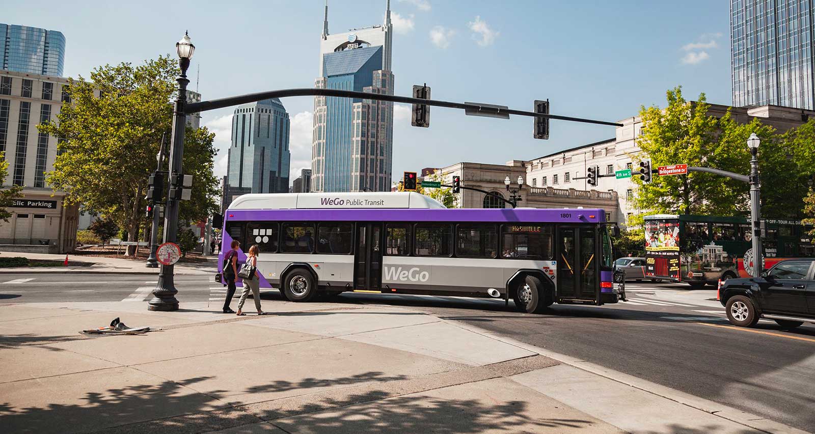 Nashville city bus turning at an intersection.