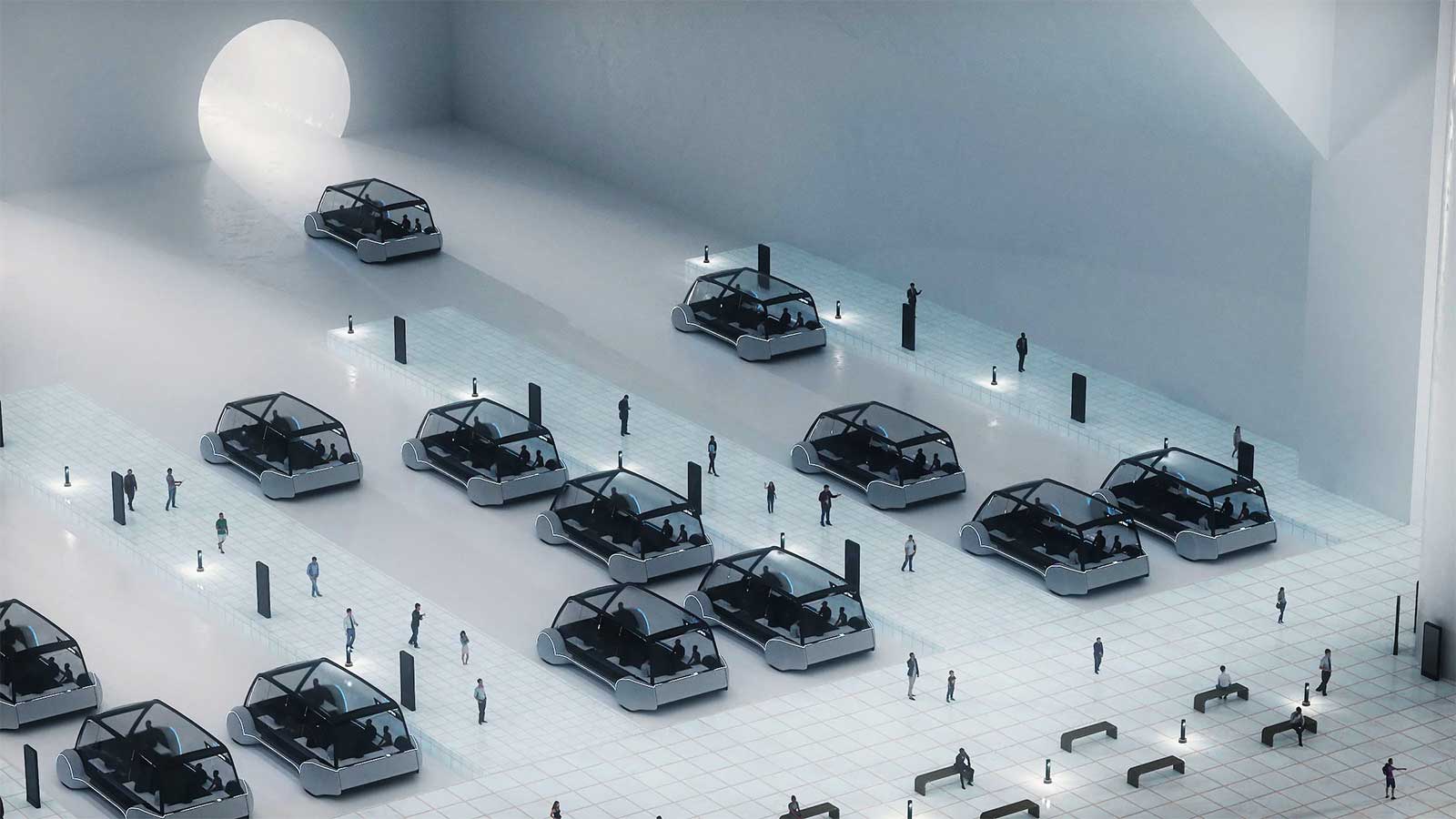 Fleet of 16-passenger electric vehicles in an underground transit center.